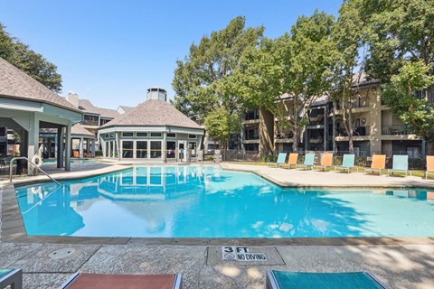 Sun-drenched pool at Laurels of Sendera apartments in Arlington, TX